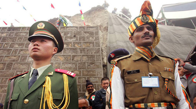China, India exchange threats 