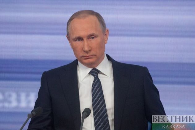 Putin takes part in vote on constitutional amendments