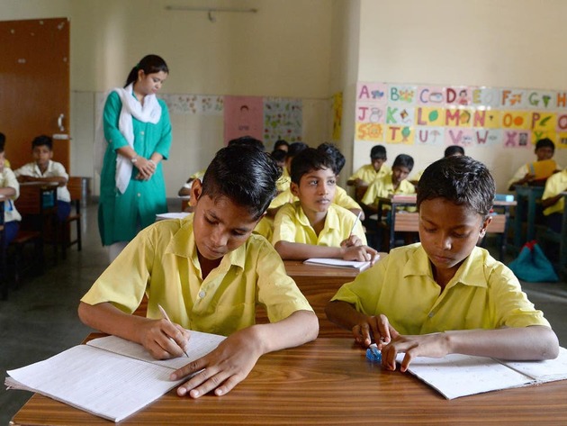 India moves to end primary teaching in English 