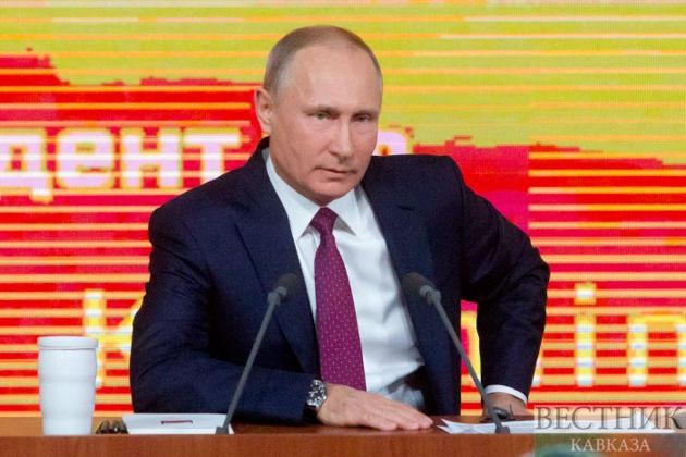 Putin says Russia tackled 2020 issues well