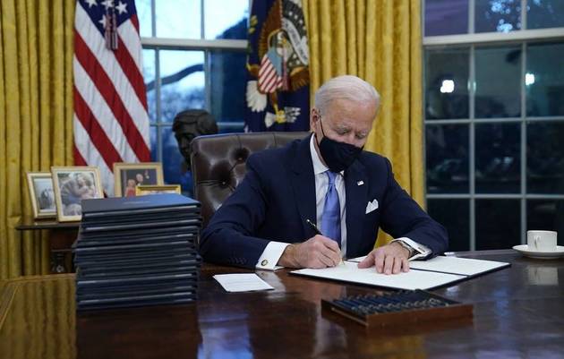 Biden returns U.S. to Paris climate accord