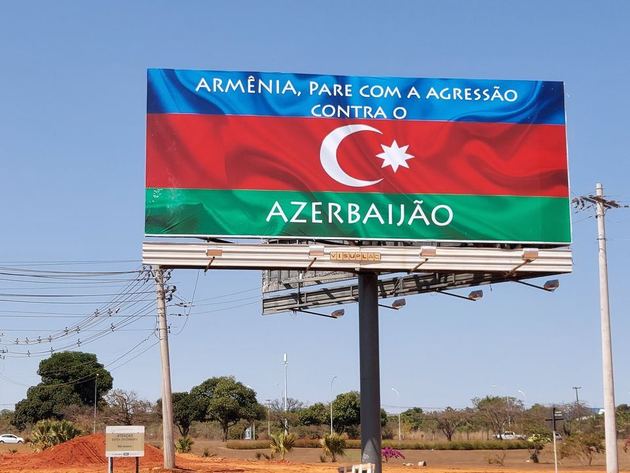 The sign on the way to the International Airport of Brasilia says: "Armenia, stop your agression against Azerbaijan"