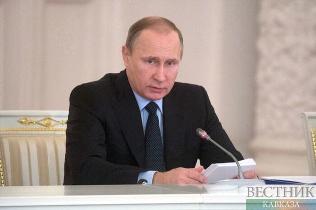 Putin: Russia to keep improving, reinforcing its armed forces