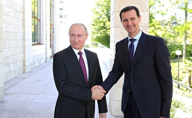Assad expresses hope for stronger ties with Russia in message to Putin