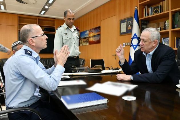 PHOTO from the website of the Israeli Defense Ministry. Head of Research and Development Yaniv Rotem and Minister of Defense Benny Gantz are delighted with the Iron Beam system