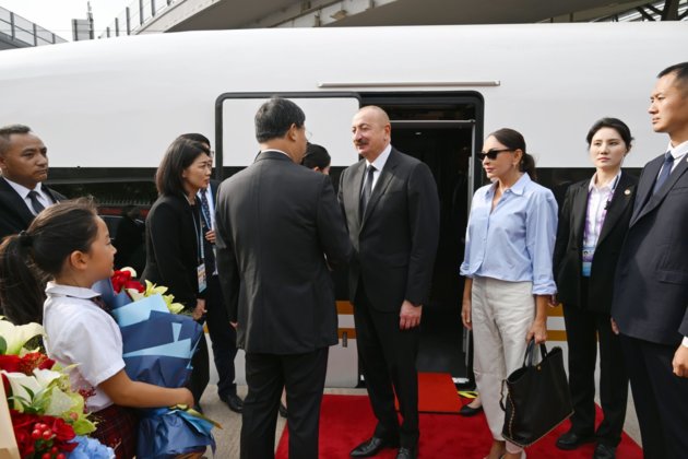 Ilham Aliyev and Mehriban Aliyeva arrive in Beijing