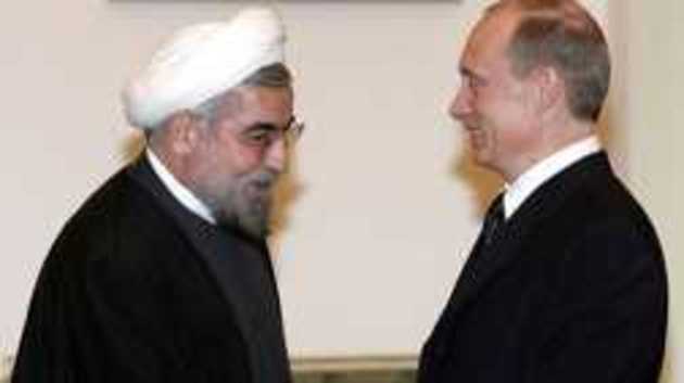 Hassan Rouhani awaits Vladimir Putin