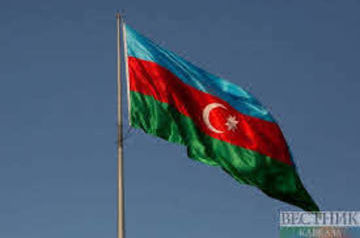Azerbaijani servicemen hoist flag on Murovdag mountain