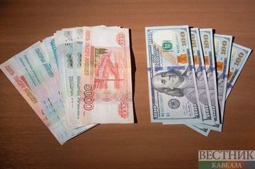 Dollar falls below 72 rubles first time since last July