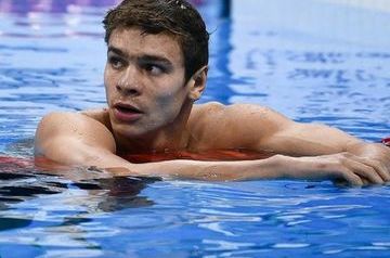 Russian swimmers win Olympic gold, silver in men’s 100m backstroke