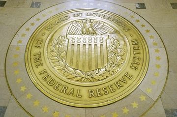 U.S. Fed holds rates near zero