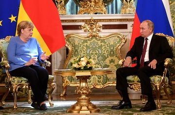 Putin held talks with Macron and Merkel