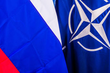 Putin: Russia ready for talks with NATO, but against reporting on national military drills