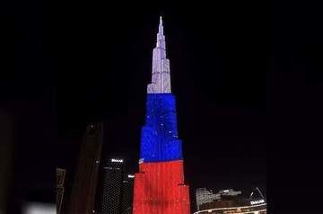 Dubai&#039;s Burj Khalifa tower highlighted in Russian flag colors