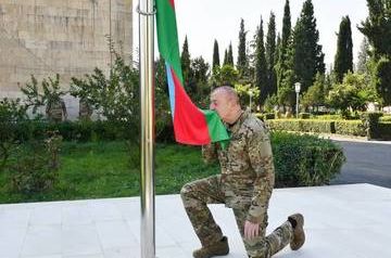 Ilham Aliyev raises flag of Azerbaijan in Aghdere