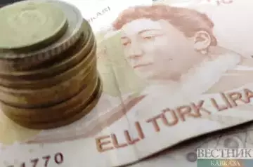 Turkish lira drops to record low against dollar and euro