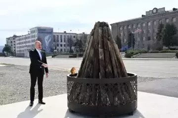 Ilham Aliyev lits Novruz bonfire in Khankendi