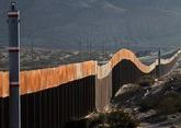 Trump border wall between U.S. and Mexico blows over in high winds - media