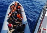 Coast Guard rescues 112 asylum seekers from rocks off Turkey
