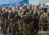 First Russian paratroopers depart from Kazakhstan
