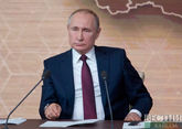 Putin signs laws admitting four new regions to Russia