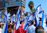 Israeli police use water cannon on anti-government protesters