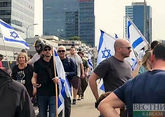 Thousands of protesters march in Tel Aviv