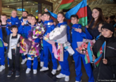 Gymnasts return to Baku with medals