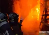 Large-scale fire being extinguished in Azov