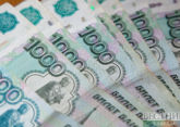 What are risks of economic overcooling in Russia?