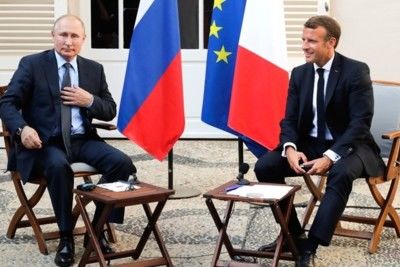 U.S. encouraged by Macron-Putin talks